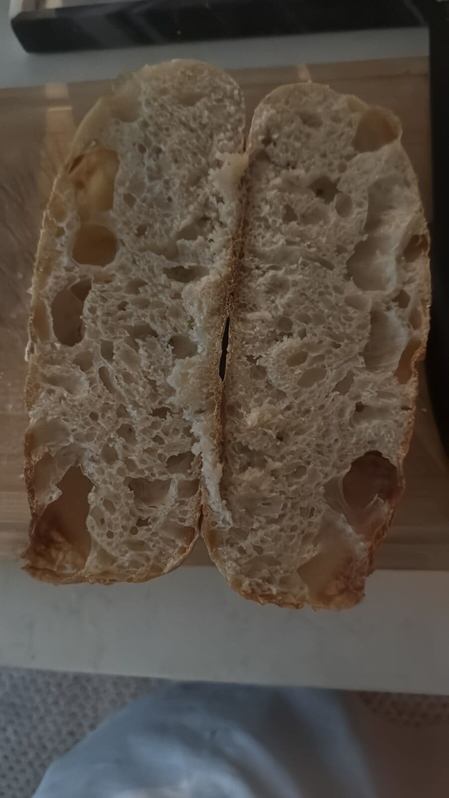 The open, lacey crumb of the Accidental Bassinage Loaf
