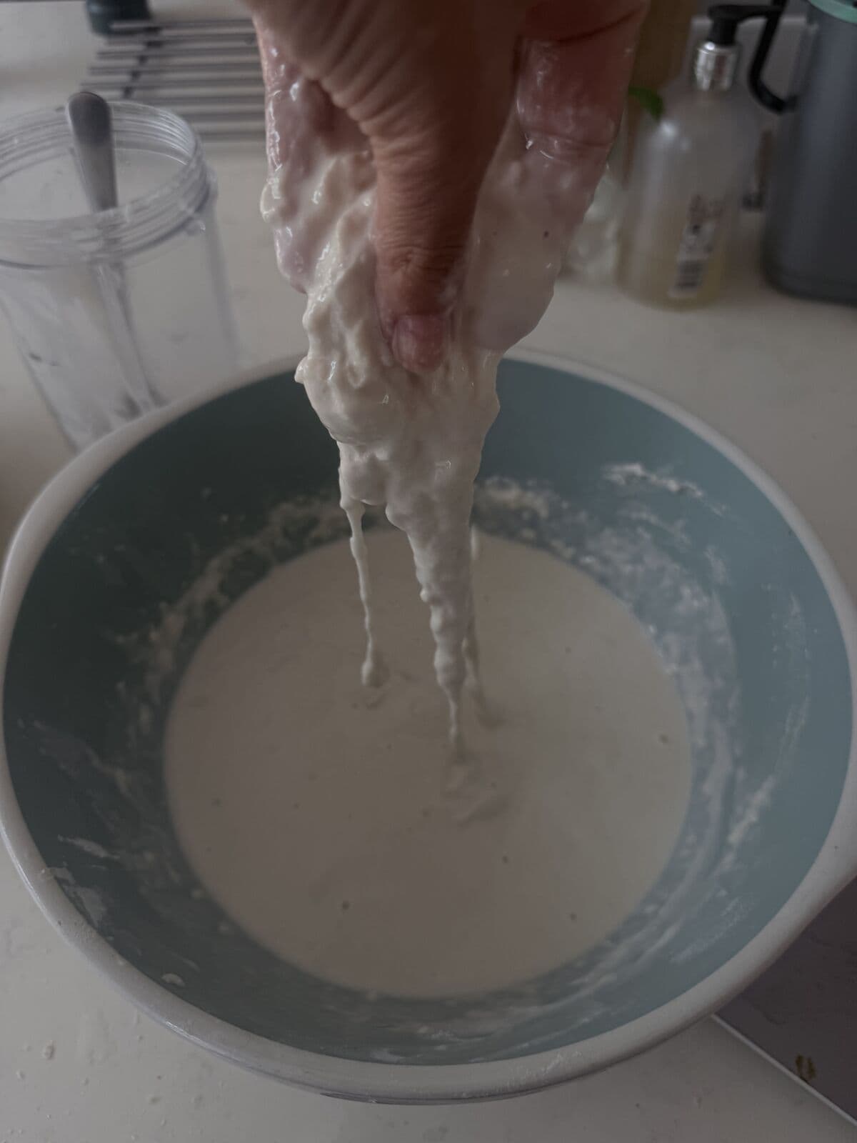 Stretching the over-hydrated dough during Stage 1