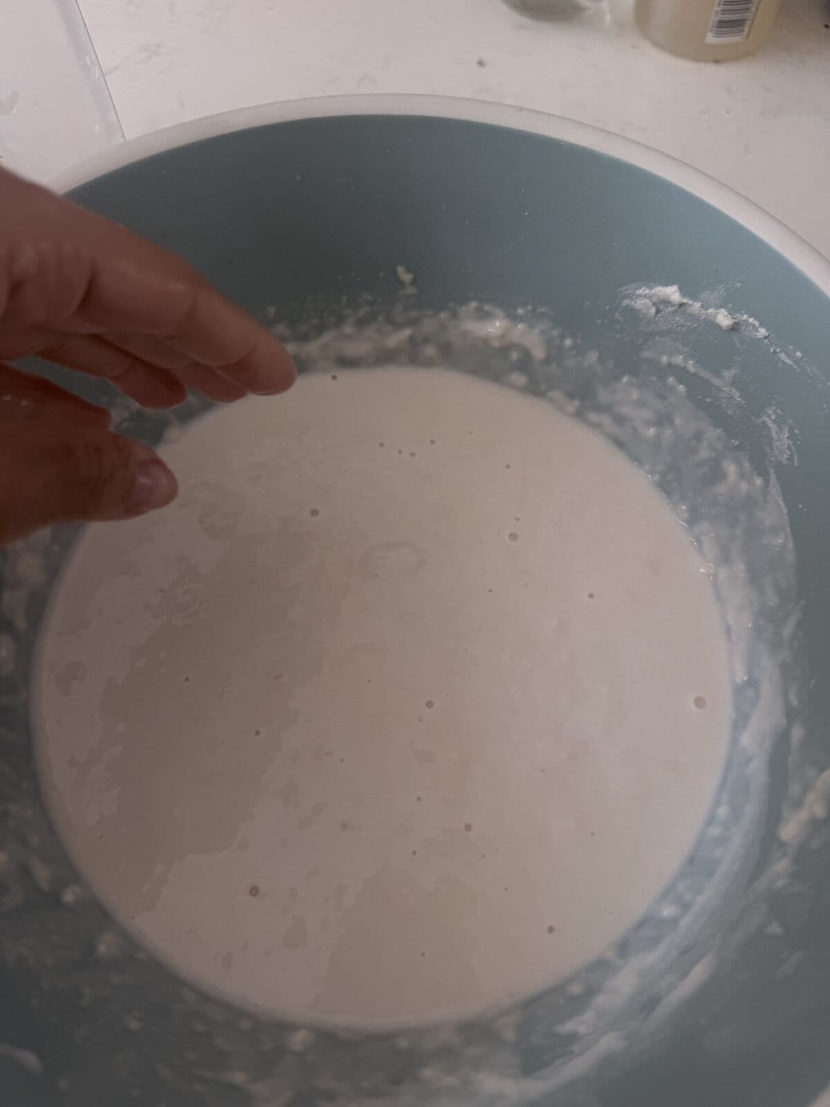 The overproofed dough stuck to the tea towel