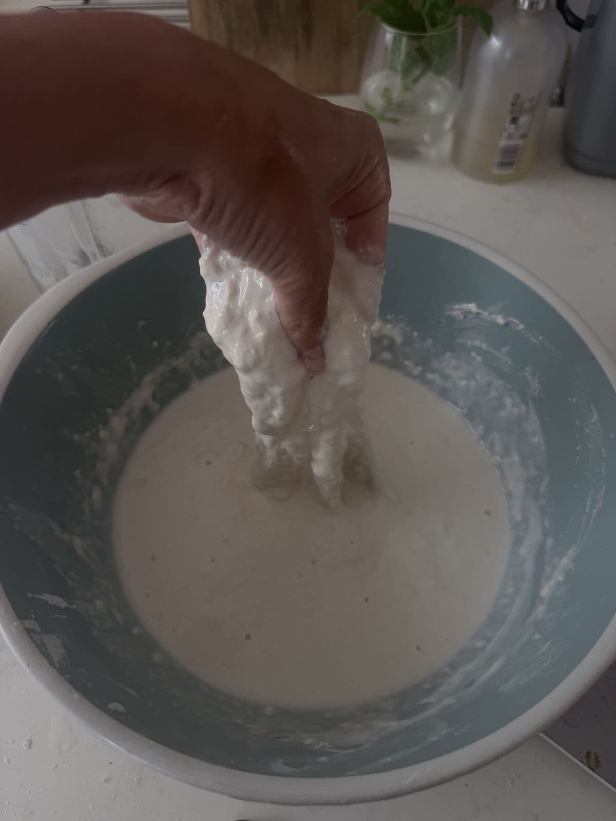The pre-shaped dough resting on the counter